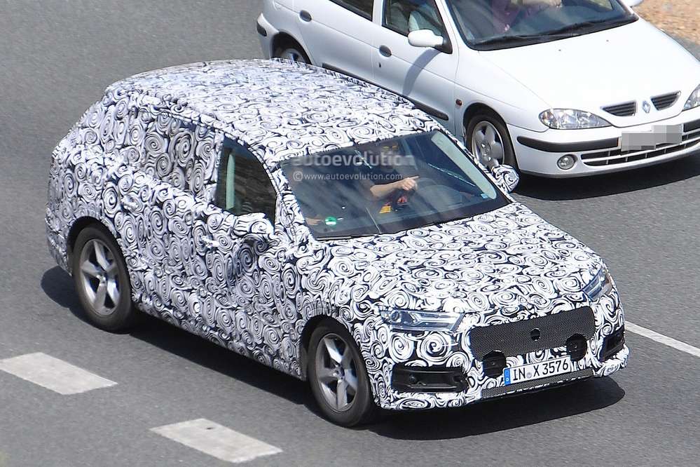 Шпионские фото раскрыли новые детали будущего Audi Q7
